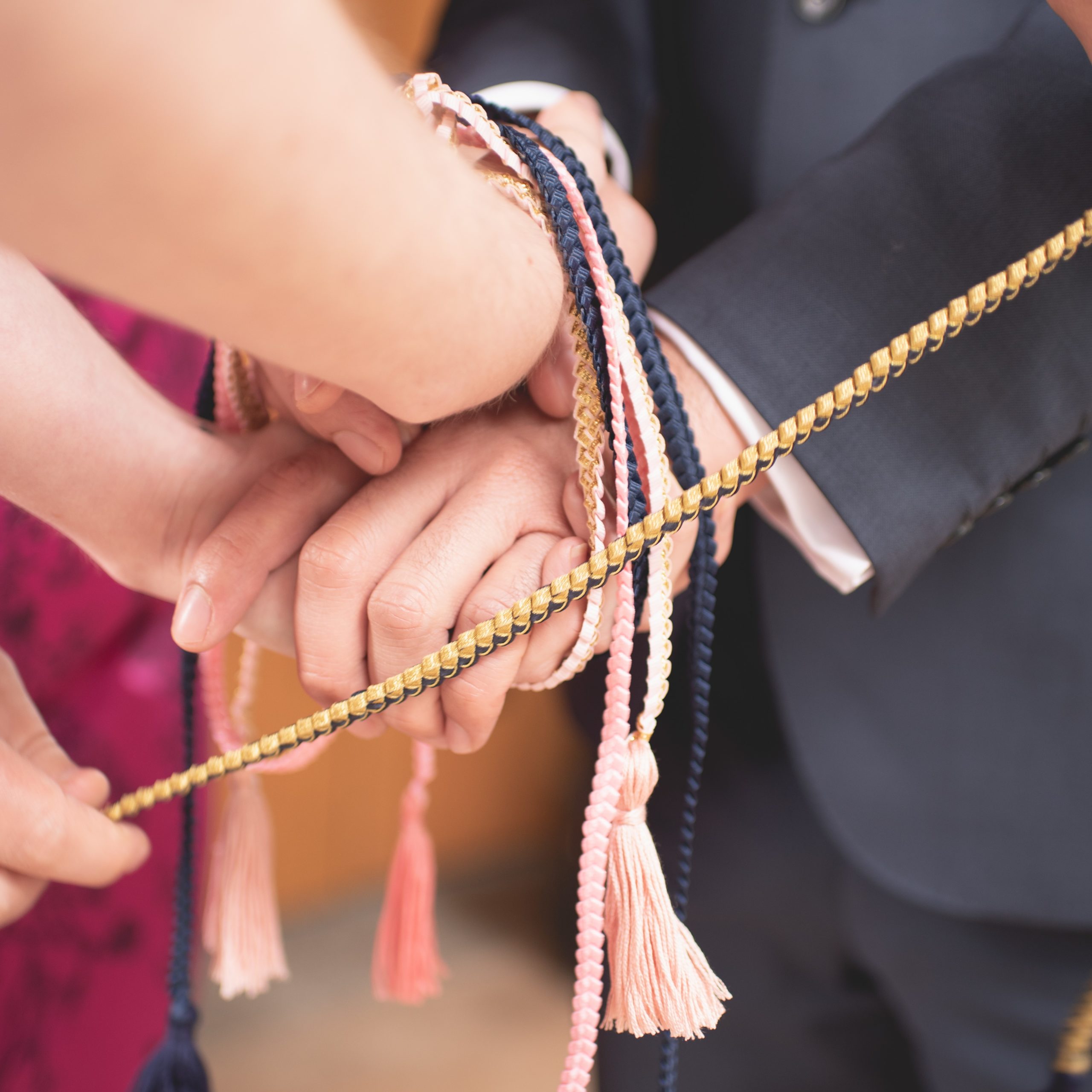 closeup of handfasting ceremony